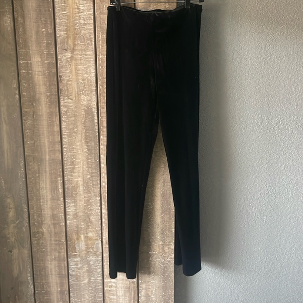 Black velvet stretch pants with a boot cut